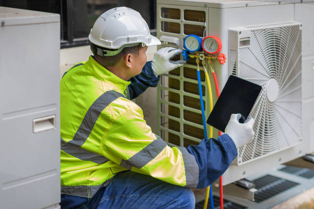 Professional Air Conditioning Repair technician working in Bedford, OH